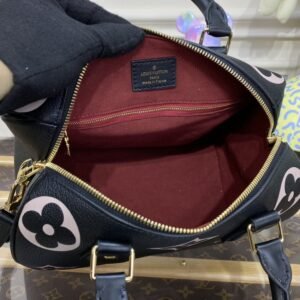 Alternative view of Replica Louis Vuitton Speedy Bandouliere 25 Black – Pink